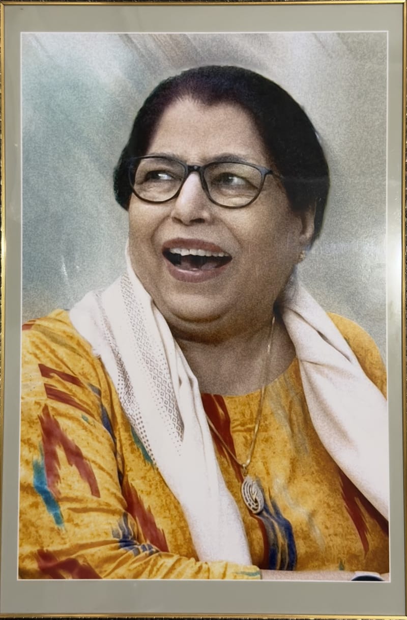 Gold-framed portrait of Prof. Dr. Usha Gupta